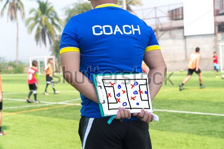 stock-photo-coach-is-coaching-children-training-in-soccer-team-391000690