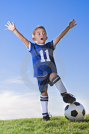 young-boy-soccer-player-celebrating-23537119